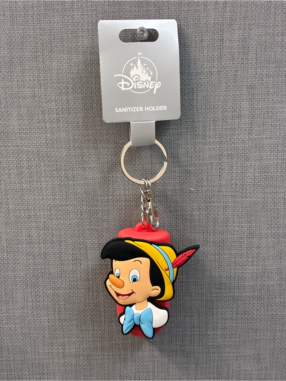 Disney’s Pinocchio Sanitizer Bottle Holder Keychain and Bag Charm